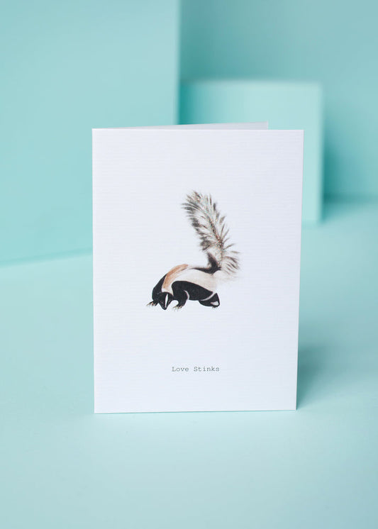 LOVE STINKS GREETING CARD